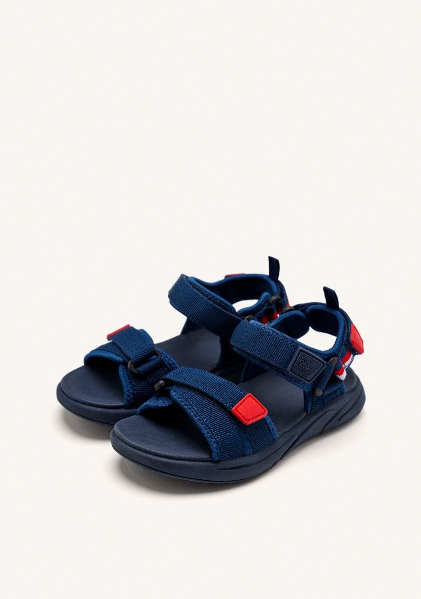 19379-chanclas-deportivas-color-azul-marino-con-acentos-de-color-para-ni-o-y-ni-a-bunnel-marino-1.jpg