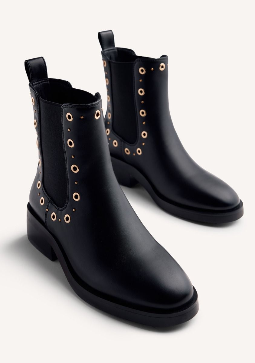 2303-botines-chelsea-tachas-y-ollados-halma-negro-1.jpg